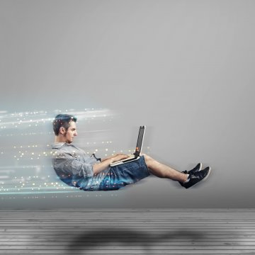 system optimizers advanced system repair man on laptop speed fast pc